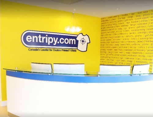 Entripy company reception with yellow bright creative wall at the back